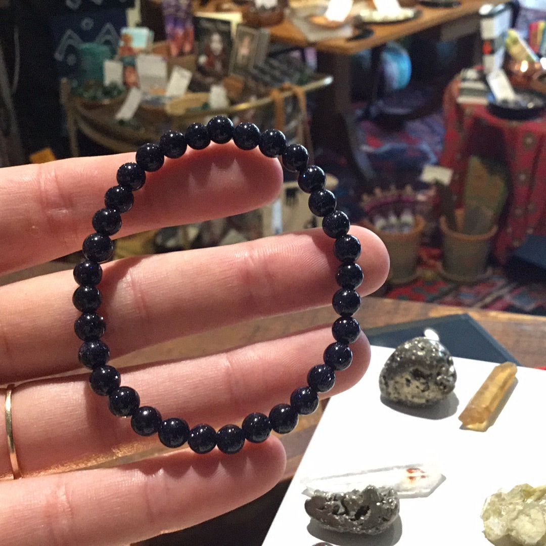 Small purple goldstone bracelet
